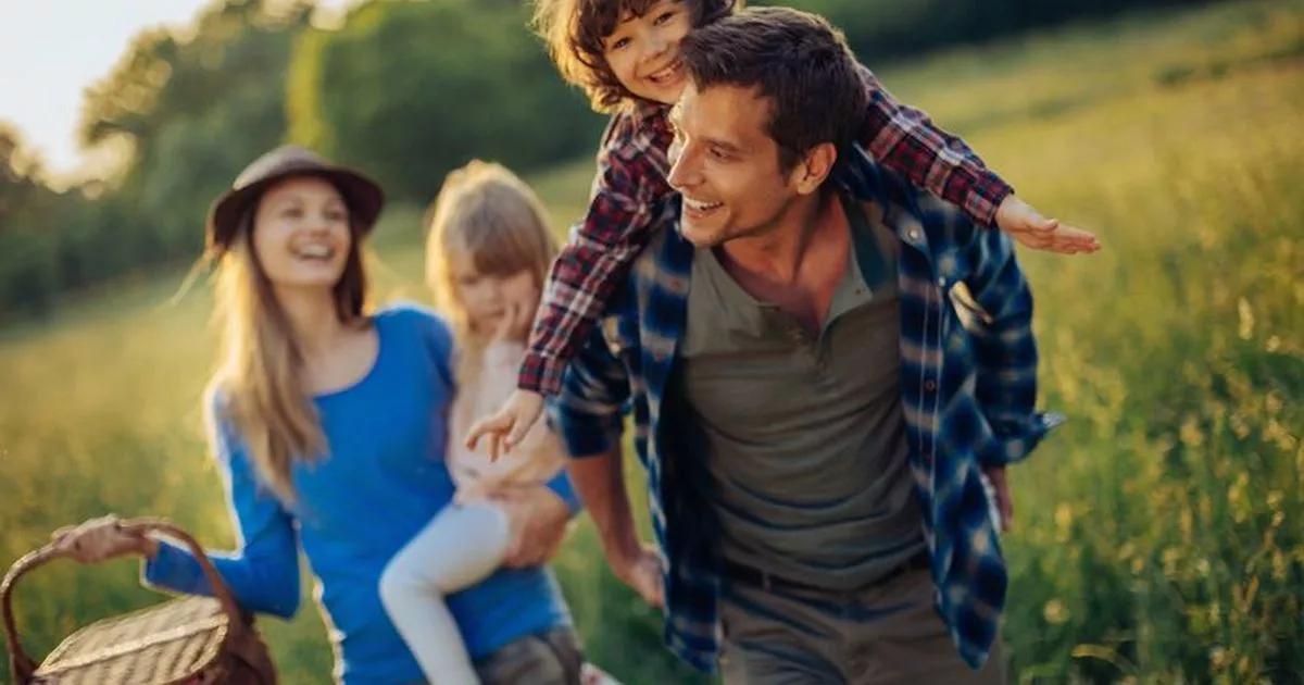 https://sbfinancialprotection.com/wp-content/uploads/2025/02/Happy-family-walk.webp